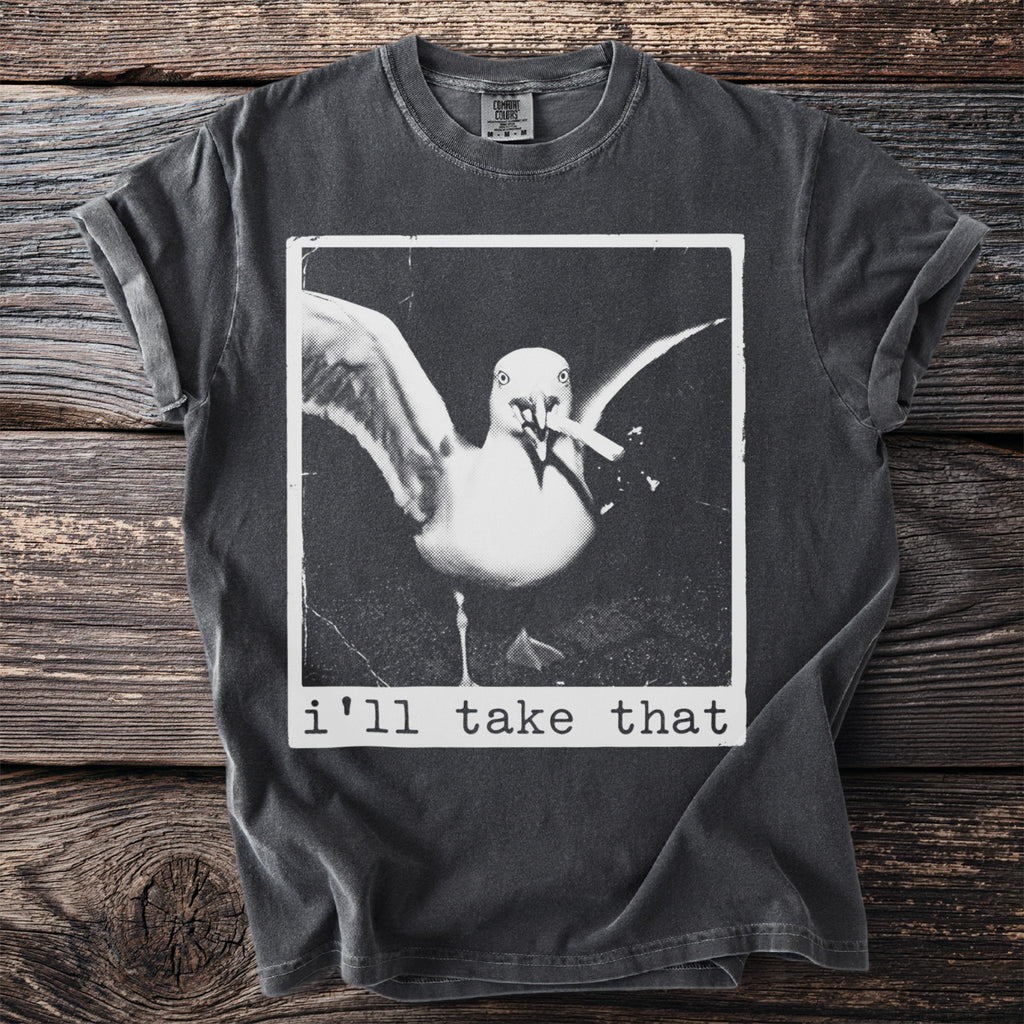 Charcoal t-shirt with a seagull holding a cigarette and text "i'll take that".