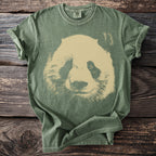 Green t-shirt with a distressed tan panda face graphic and Comfort Colors label.
