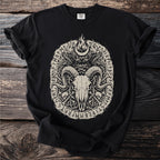 Black t-shirt with a ram skull surrounded by runes, flames, and birds.