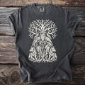 Dark t-shirt with white Odin, ravens, wolves, and tree graphic.