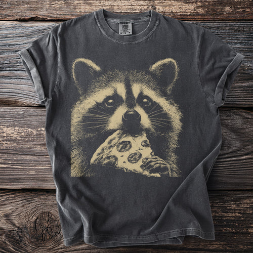 Dark t-shirt with a vintage print of a raccoon eating pizza.