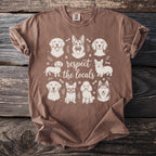 Brown t-shirt with sketch art of various dogs and text "respect the locals".