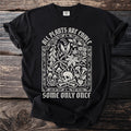 Black t-shirt with "ALL PLANTS ARE EDIBLE SOME ONLY ONCE" text and floral skull design.