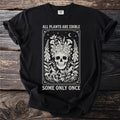 Black t-shirt with a skull and flowers graphic, reading "All Plants Are Edible Some Only Once."