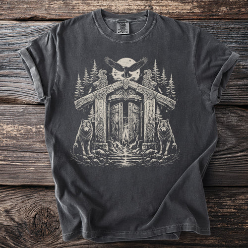 Dark t-shirt with Viking-inspired graphic of wolves, eagle, and ancient gate.