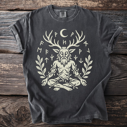 Dark grey t-shirt with a light graphic of a horned figure surrounded by runes and leaves.