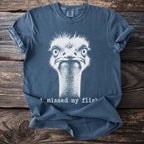 Blue t-shirt with white distressed ostrich graphic and "i missed my flight" text.
