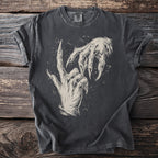 Dark t-shirt with a graphic of two sketched monster hands with sharp claws.