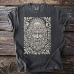 Dark grey t-shirt with a green man surrounded by nature and woodland creatures.