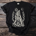 Black t-shirt with a cream graphic of a wolf howling at the sun and moon.