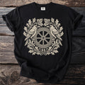 Black t-shirt with a cream graphic of two ravens flanking a Viking wheel with oak leaves.