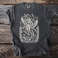 Dark t-shirt with a cream graphic of a winged warrior on a horse above a fallen figure.
