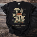 Black t-shirt with botanical illustration of mushrooms labeled "The Forager's Almanac".