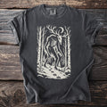 Dark grey t-shirt with a cream-colored graphic of a skeletal creature with antlers in a forest.