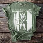 Green t-shirt with "emotionally unavailable" text and a wolf in ripped jeans.