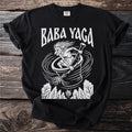 Black t-shirt with "Baba Yaga" text and a witch flying in a mortar with a broom.