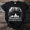 Black t-shirt with two ravens and "attempted murder" text.
