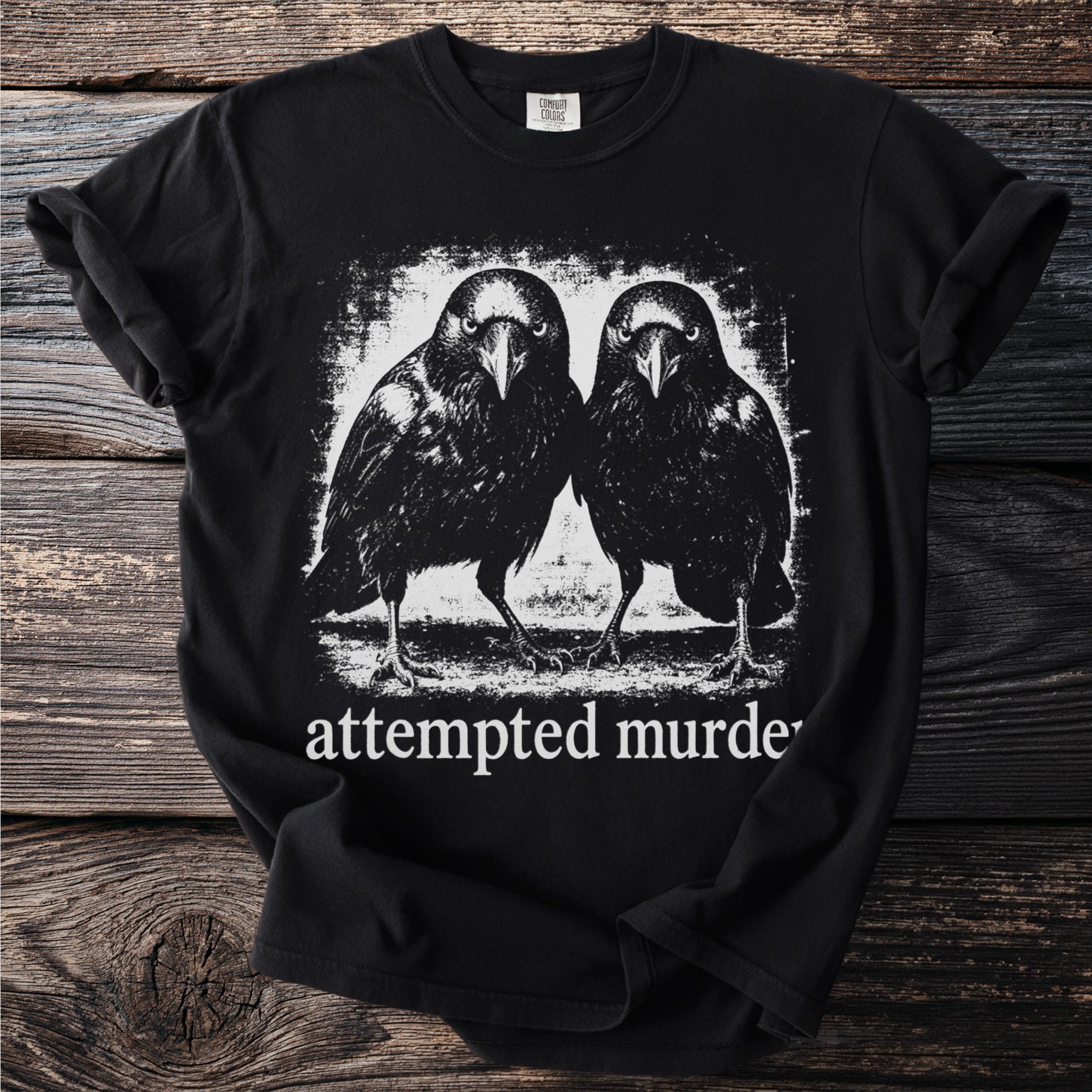 Black t-shirt with two ravens and "attempted murder" text.