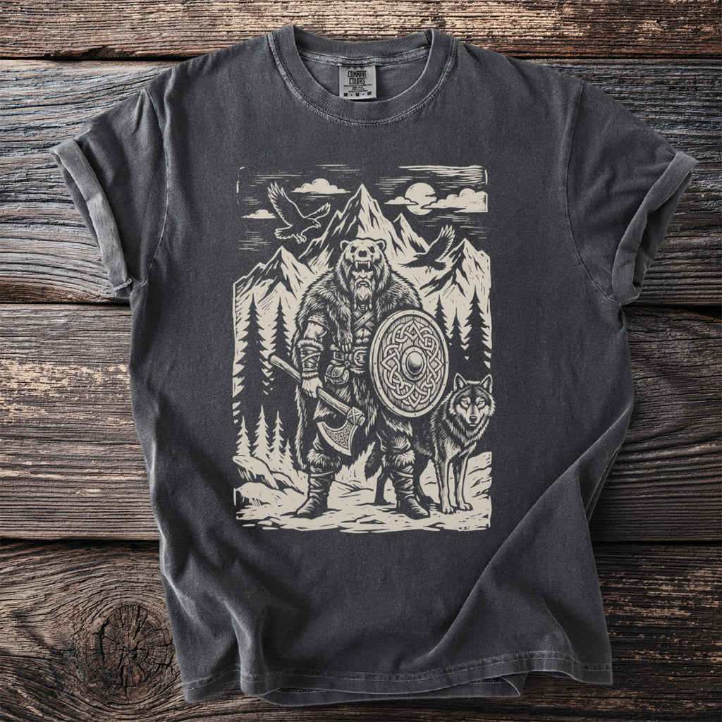 Graphic t-shirt with a Viking bear warrior holding an axe and shield with a wolf companion.
