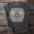 Dark grey t-shirt with a cream-colored raven and wheel design surrounded by oak leaves.