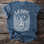 Blue t-shirt with white Leshy design: slavic forest god folklore.