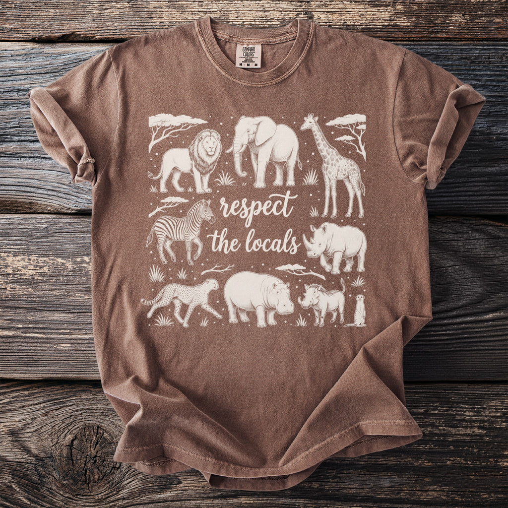 Brown t-shirt with white graphic of African animals and text "respect the locals."