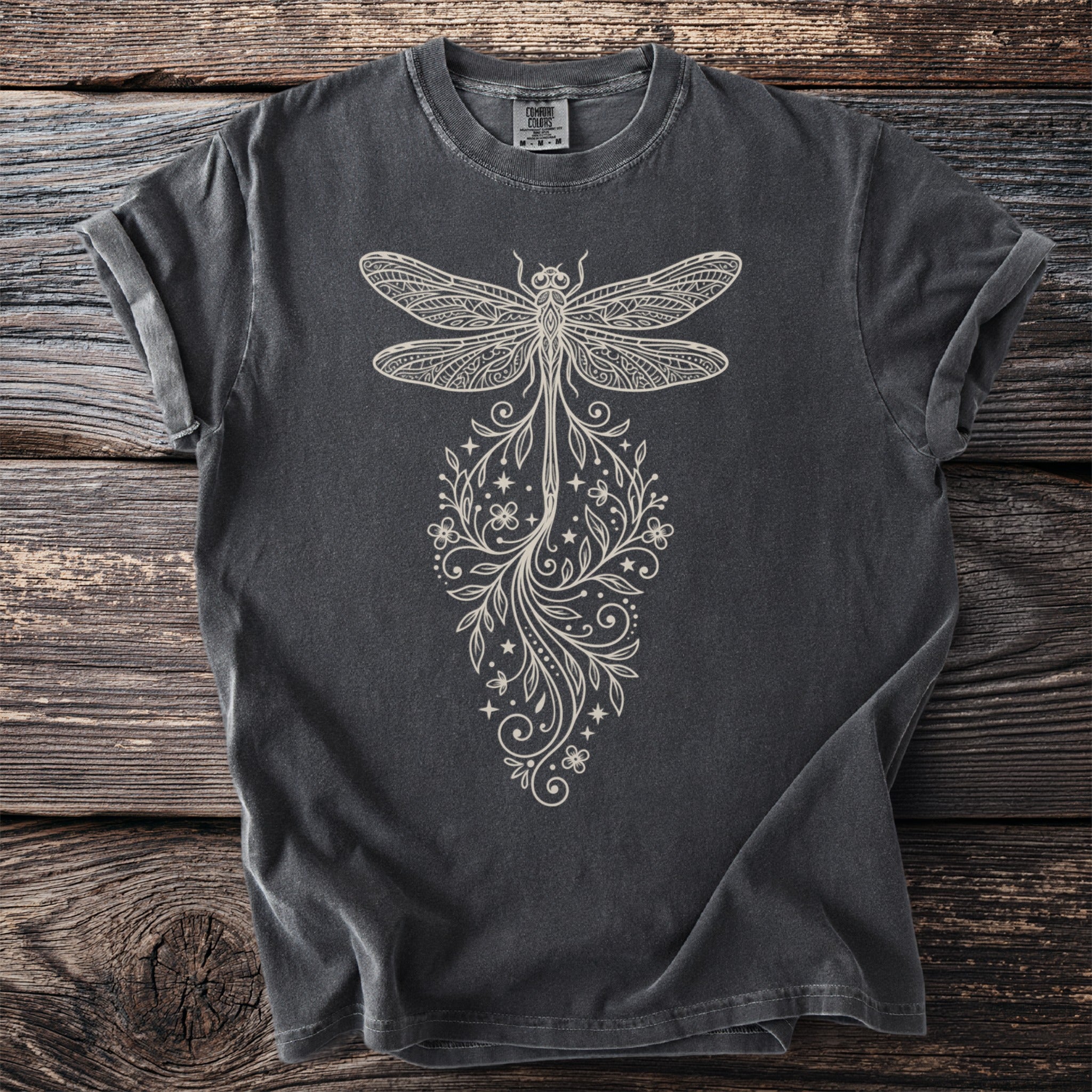 Dark gray t-shirt with a cream-colored dragonfly and floral design.