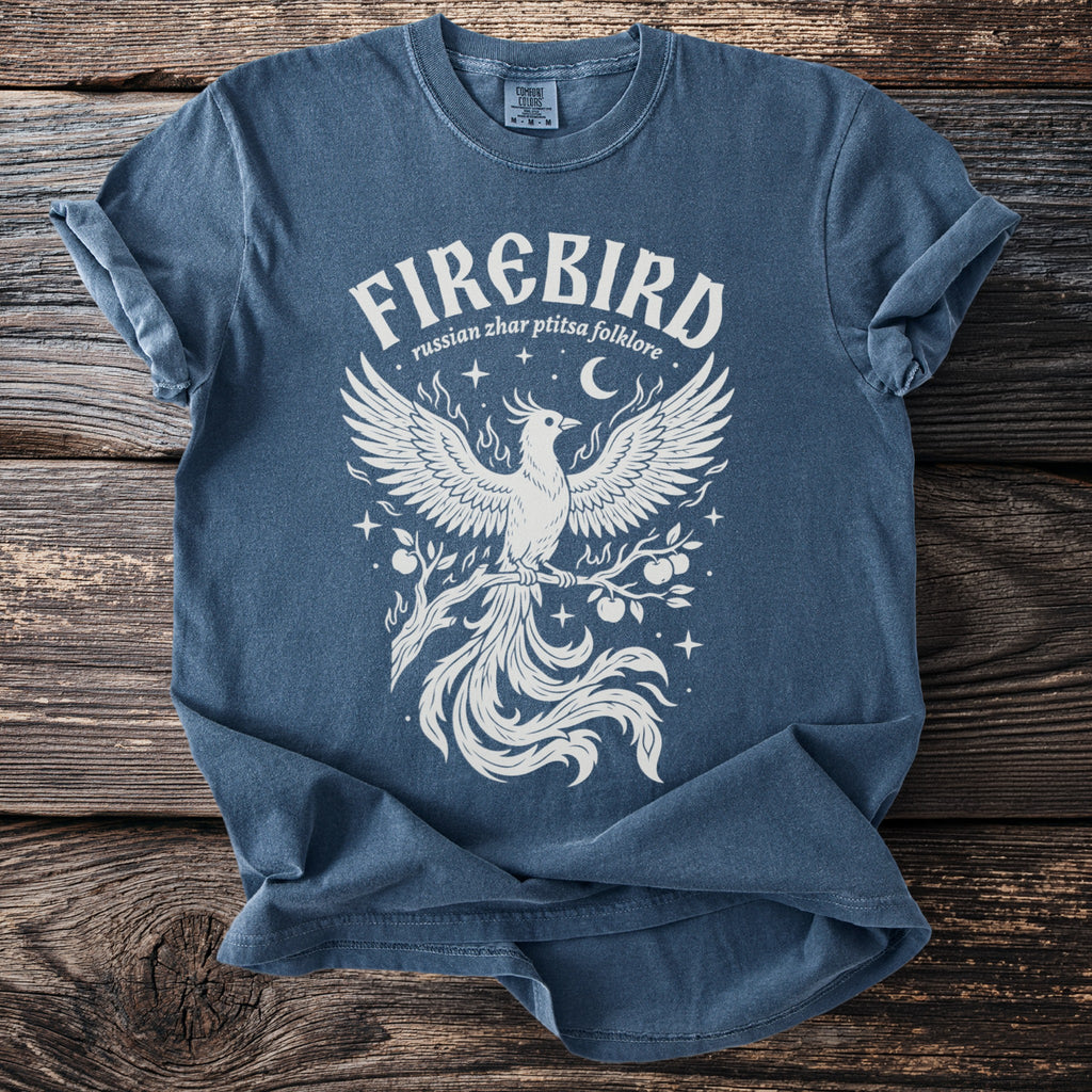 Blue t-shirt with white "Firebird" text and phoenix illustration.