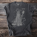 Dark gray t-shirt with white line art of a witch, wolf, monkshood, and black hellebore.