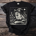 Black t-shirt with a vintage linocut style print of a fox in a witch hat.