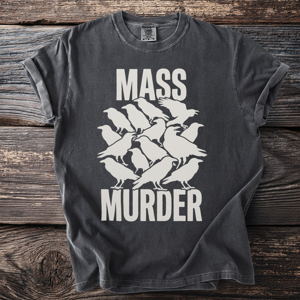 Dark grey shirt with white text "MASS MURDER" above a stylized flock of crows.