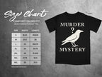 Comfort Colors 1717 heavyweight adult tee size chart with "Murder Mystery" raven graphic.