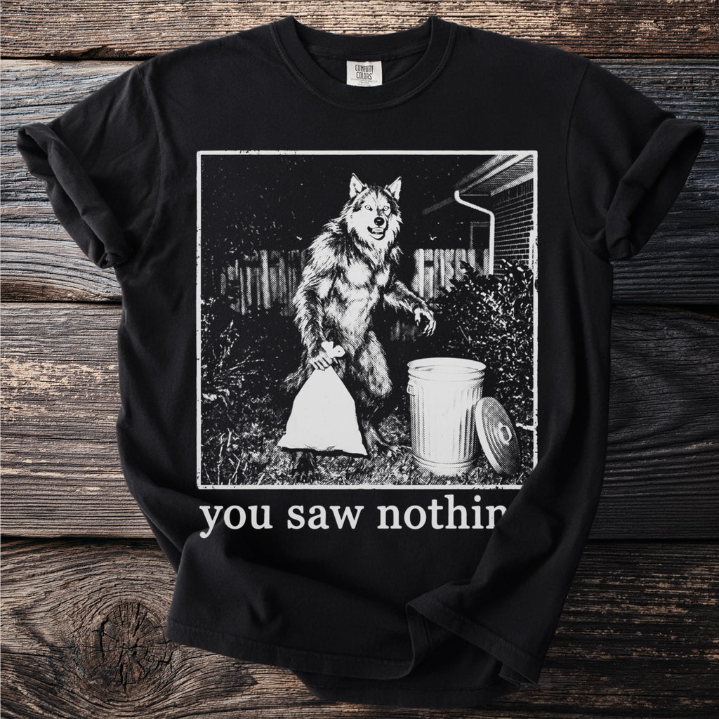 Werewolf holding a trash bag next to a trash can with text "you saw nothin".