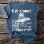Opossum holding a trout with text "fish around and find trouty".