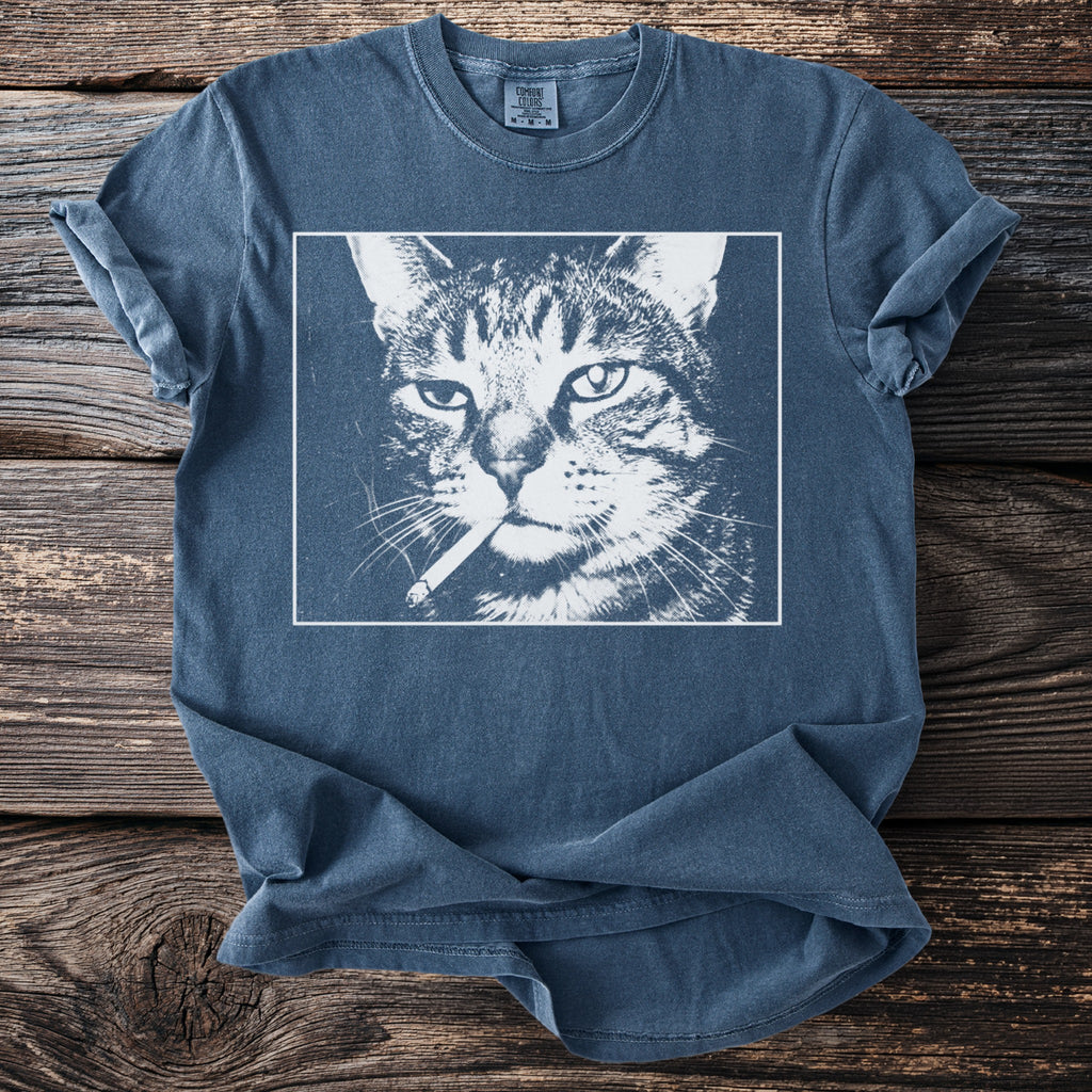 Blue t-shirt with a graphic of a cat smoking a cigarette.