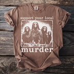 Brown t-shirt with "support your local murder" graphic featuring four crows.