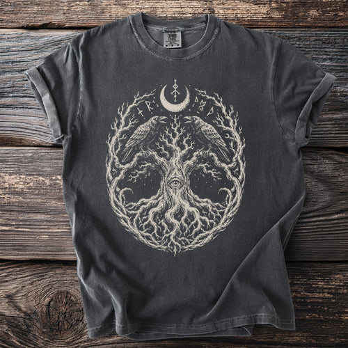 Dark grey t-shirt with a circular design of a tree, two ravens, and an eye.
