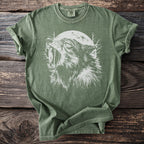 Green t-shirt with a white graphic of a wolf howling at a moon.