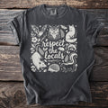 Dark grey t-shirt with white graphic of forest animals and "respect the locals" text.