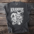 Dark grey t-shirt with white Krampus illustration and text.