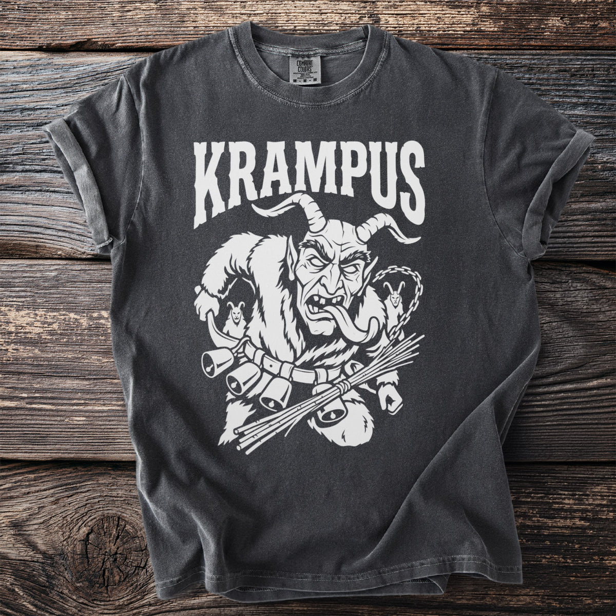 Dark grey t-shirt with white Krampus illustration and text.