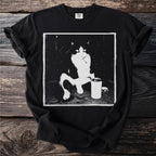 Black t-shirt with a distressed graphic of a tuxedo cat sitting with a can.