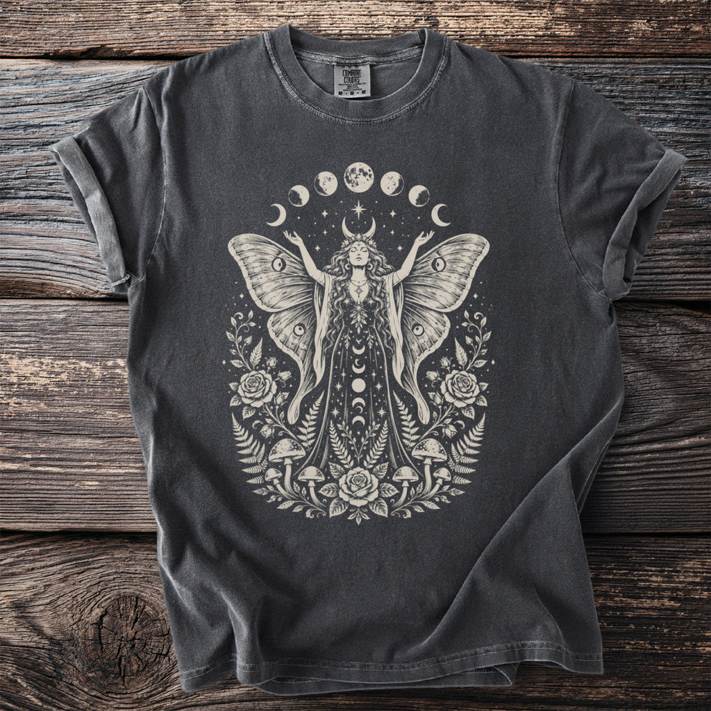 Dark grey t-shirt with moth goddess, moons, roses, ferns, and mushrooms graphic.