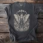Dark grey t-shirt with moth goddess, moons, roses, ferns, and mushrooms graphic.