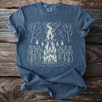 T-shirt with a white graphic of robed figures holding torches around a bonfire.