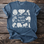 Blue t-shirt with line art of African animals and text "respect the locals".