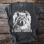 Dark grey t-shirt with white squirrel graphic and text "i have rabies".