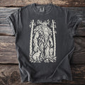 Dark t-shirt with a cream graphic of a leafy forest spirit, rabbit, fox, and birch trees.