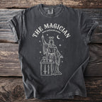 Dark gray t-shirt with "The Magician" tarot design featuring a robed figure and occult symbols.