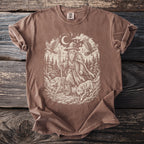 Brown t-shirt with a black and white graphic of a wizard, wolves, and birds in a forest.